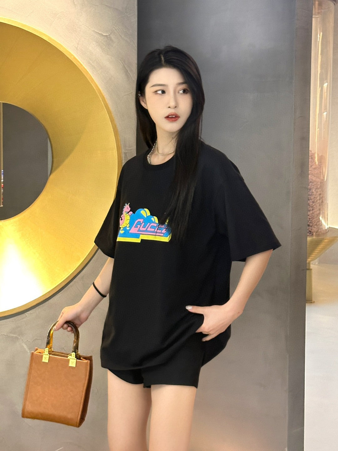 Gucci Black T-Shirt with Pink Dinosaur Graphic