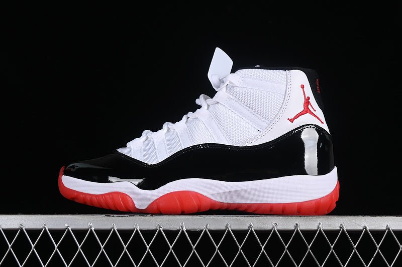 AIR JORDAN 11 RETRO BLACK/WHITE/RED - Prime Reps