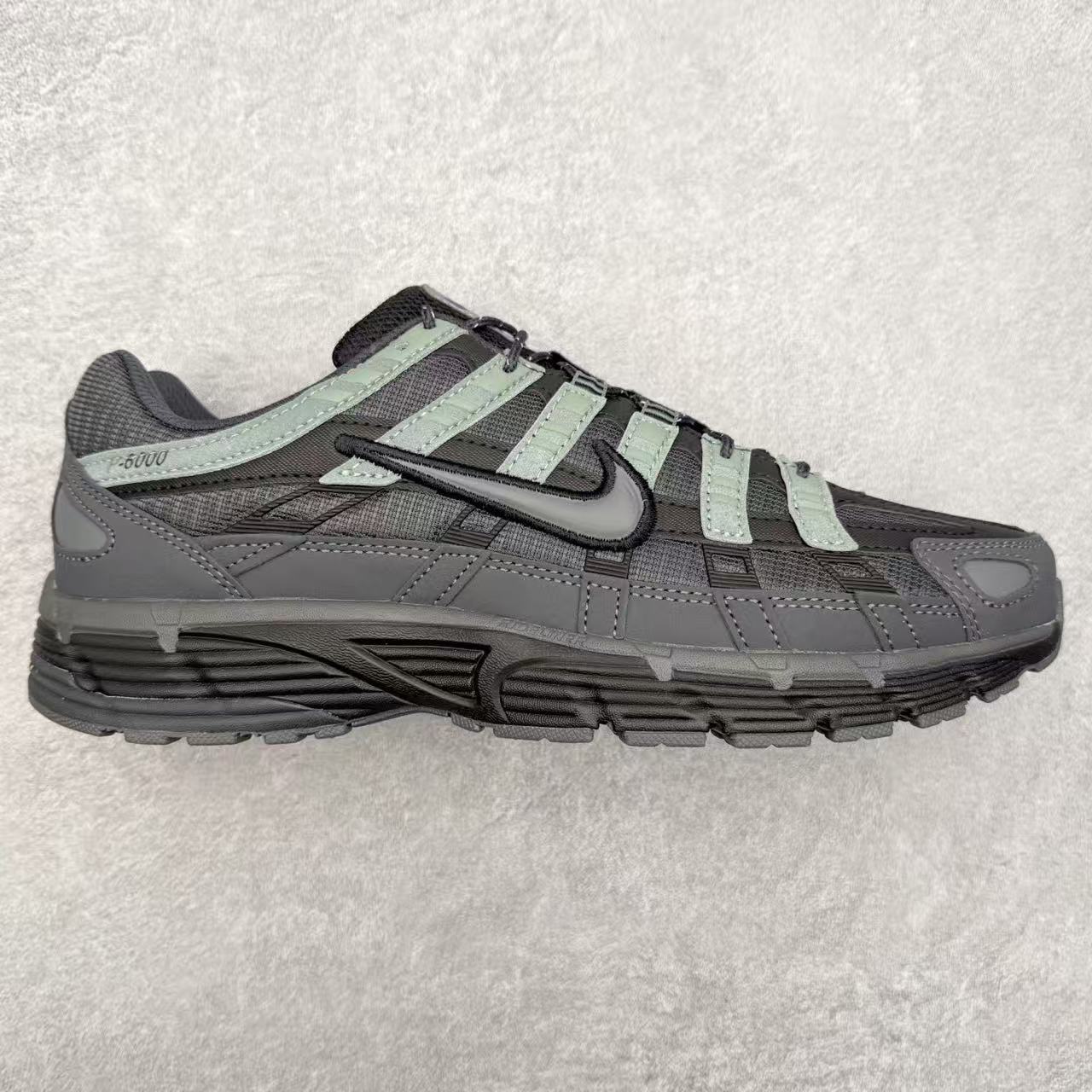 Nike in Black/Green: Nocturnal Foliage