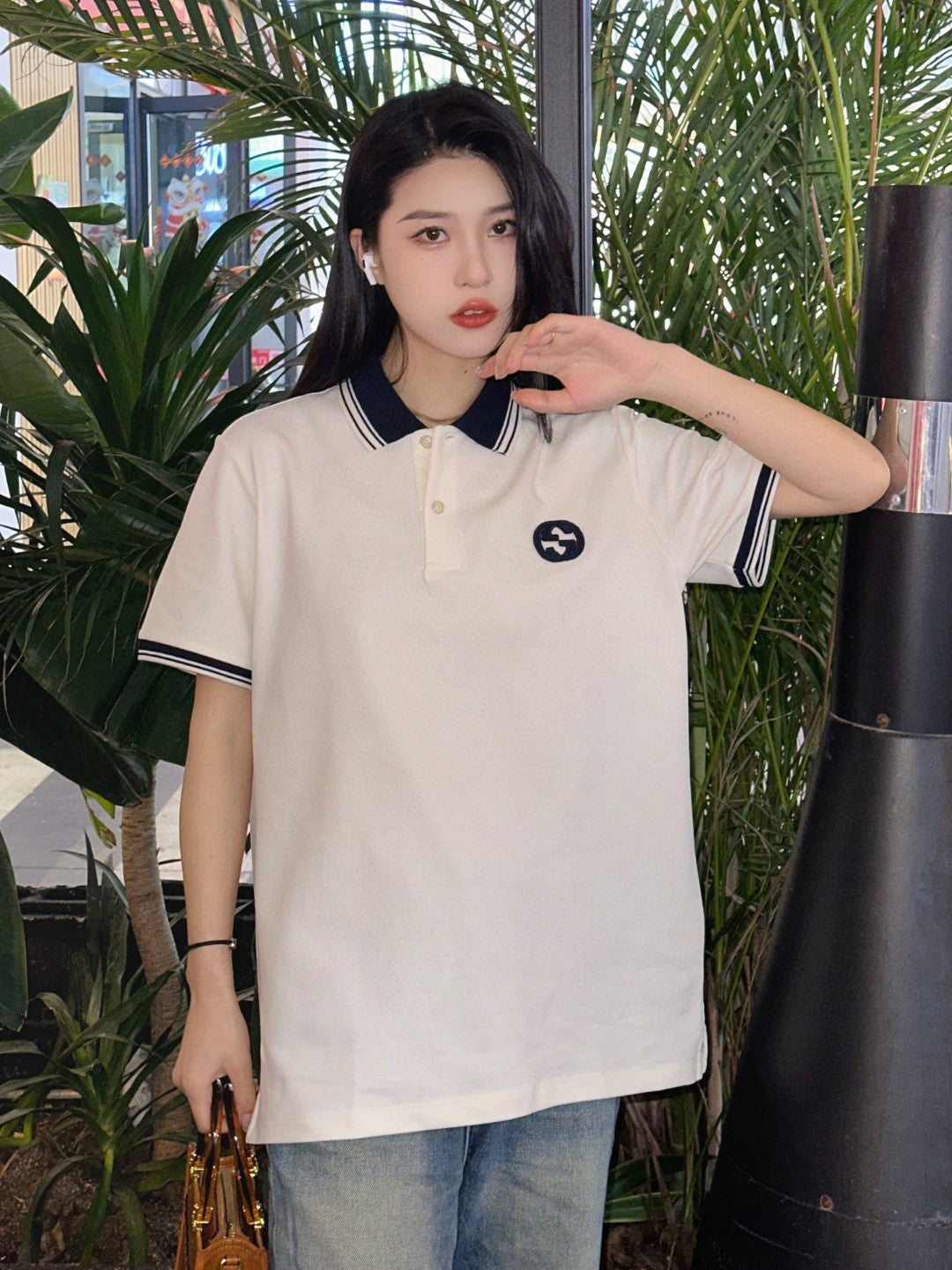 Pra*a logo patch polo shirt