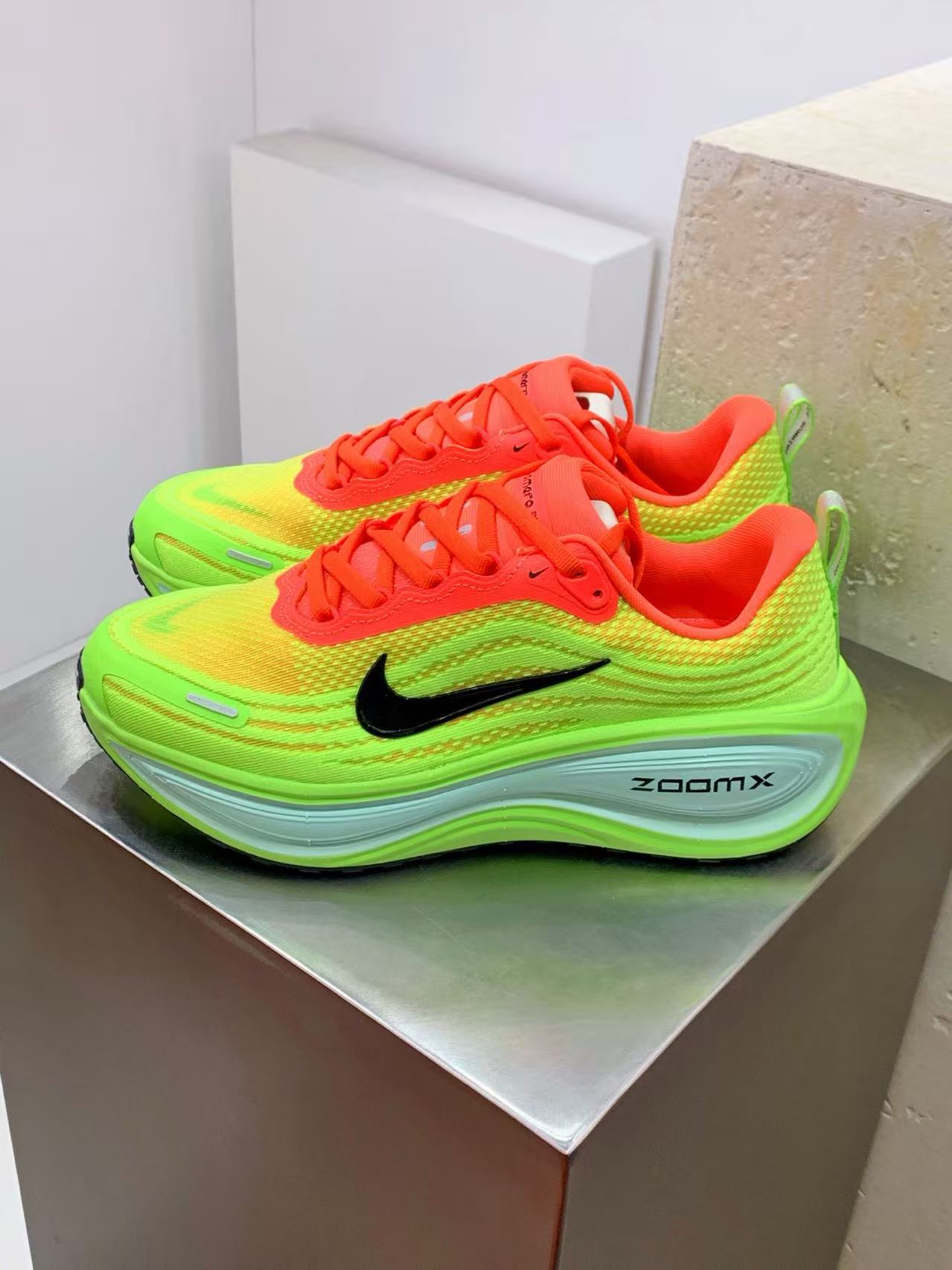 Nike Zoom Vomero in Red/Green: Festive Velocity