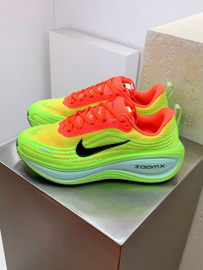 Nike Zoom Vomero in Red/Green: Festive Velocity