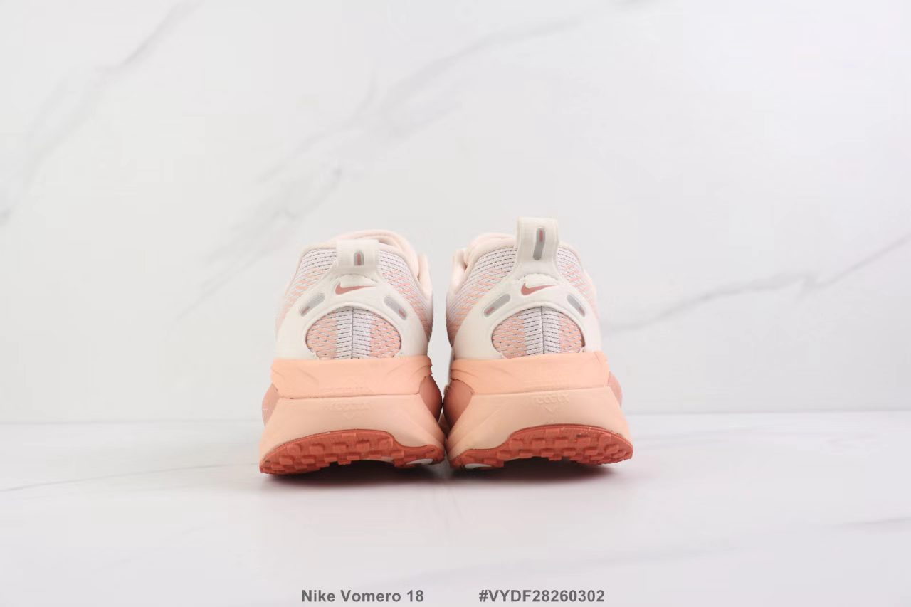 Nike Zoom Vomero in Light Orange: Citrus Zest