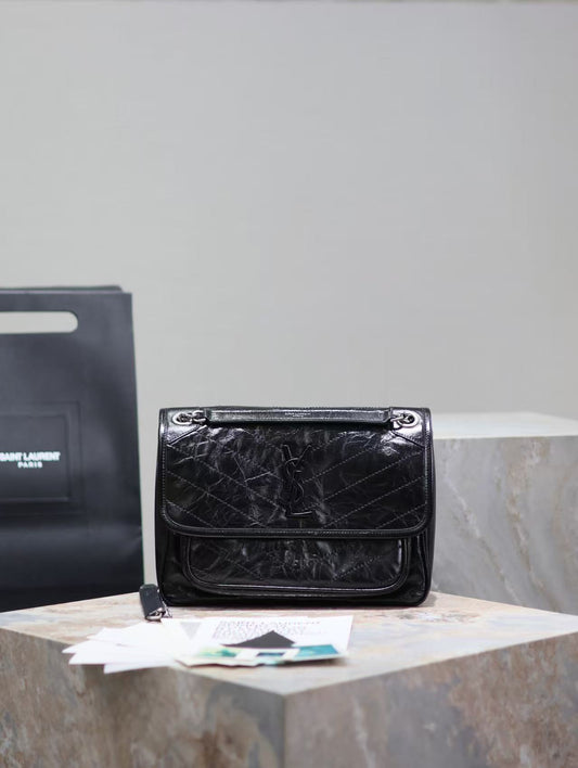 Saint Laurent Black Bag with Silver Chain
