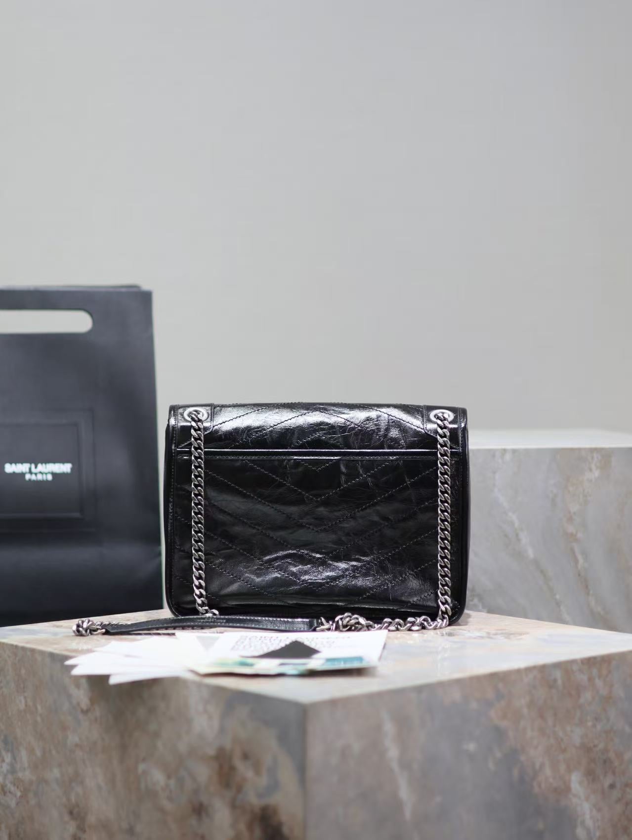 Saint Laurent Black Bag with Silver Chain