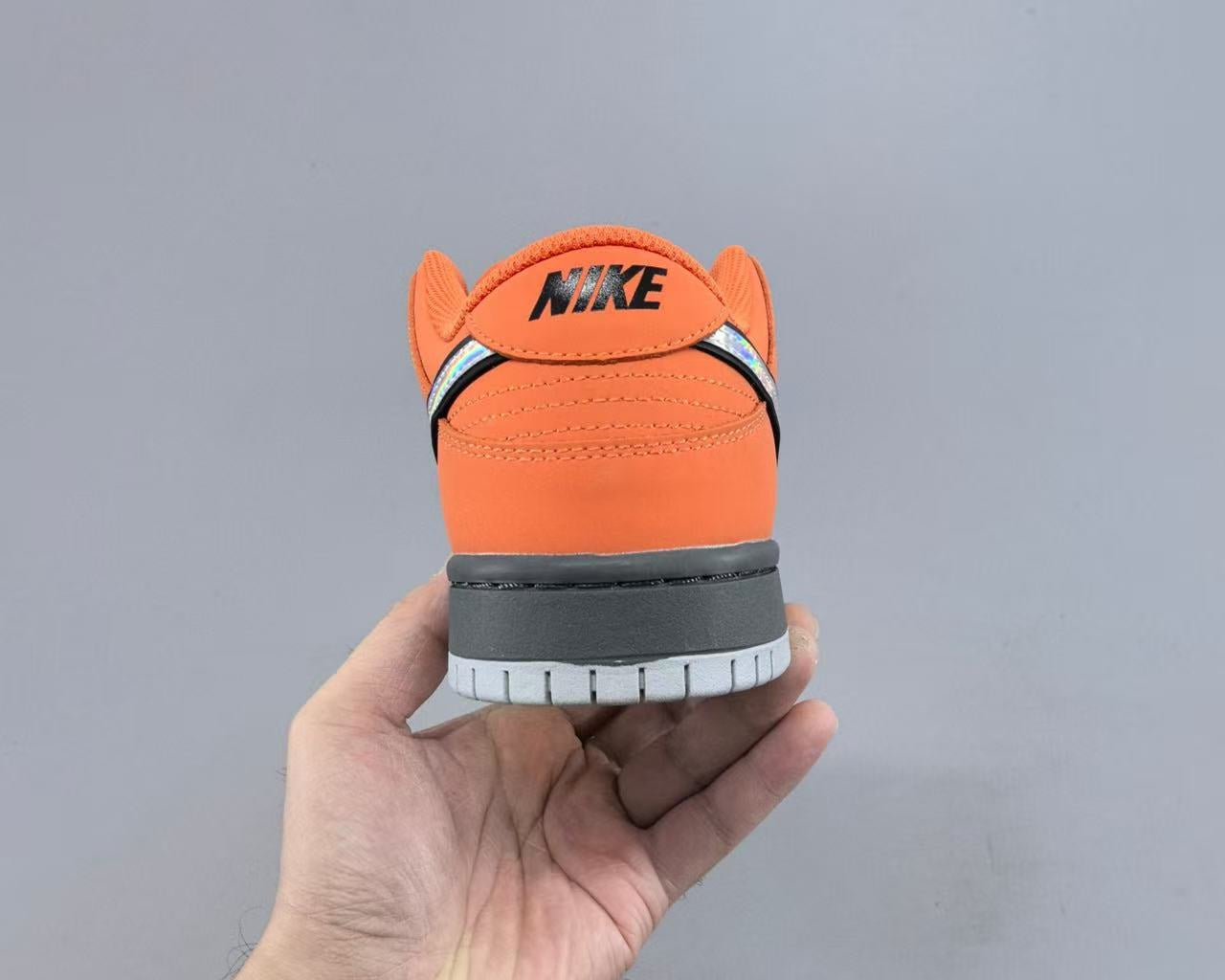 Nike SB Dunk Low “Muni Fast Pass” – Safety Orange/Baroque Brown