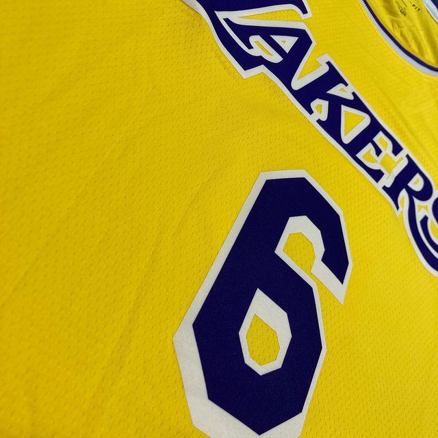 LeBron jersey, Lakers Icon Edition, classic design, player name and number, iconic colors, authentic NBA product, breathable fabric, game-day apparel, collector's item, Lakers fan merchandise.