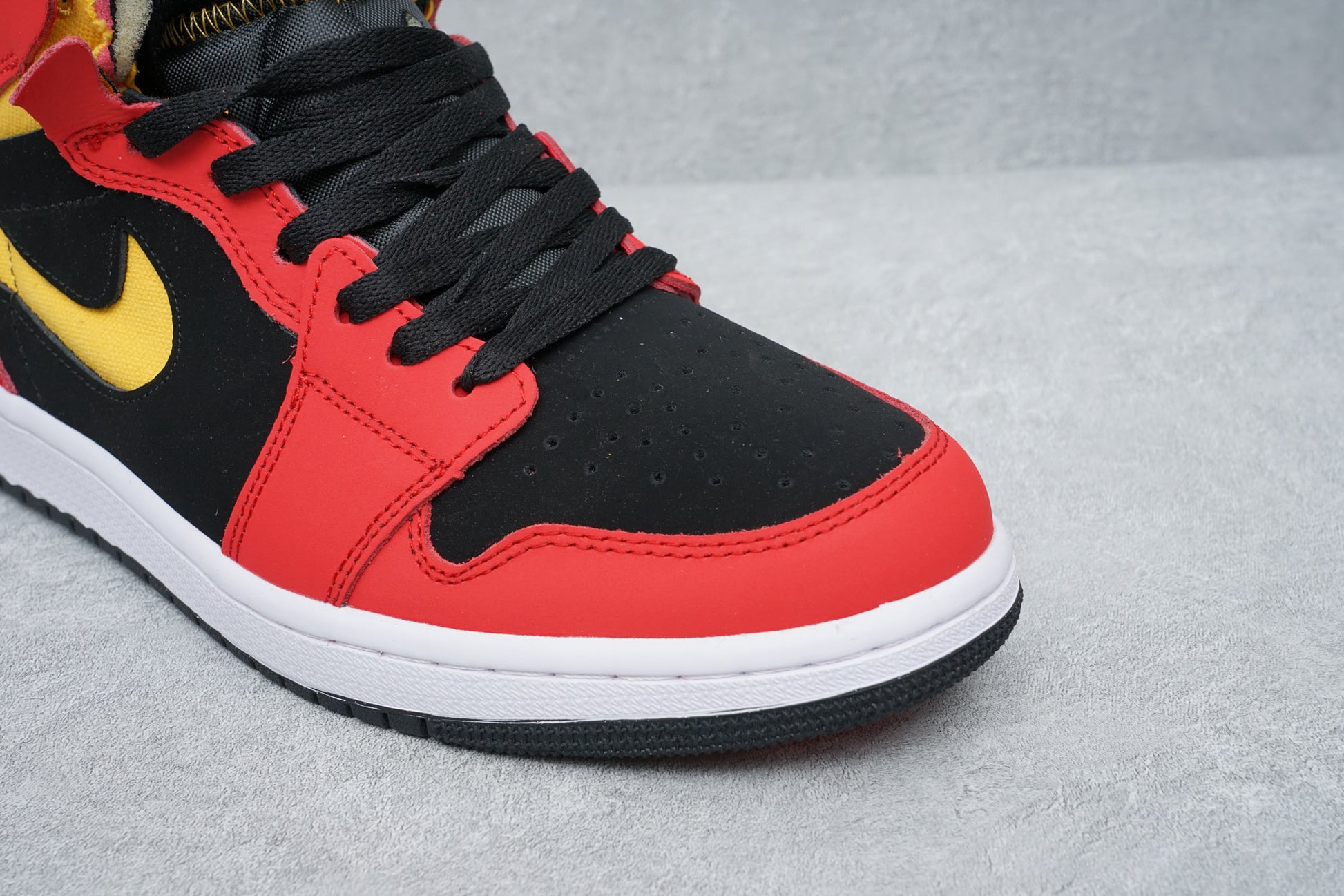 Iconic silhouette, Black Chile Red colorway, Comfortable design, Bold color combination, Premium materials, Zoom Air cushioning, Fashion-forward statement, Standout sneakers, Versatile style, All-day comfort.