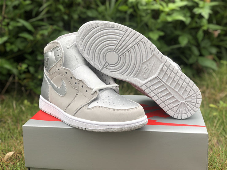 Iconic silhouette, CO Japan collaboration, Neutral Grey colorway, Sophisticated design, Premium materials, Comfortable fit, Nike Air cushioning, Fashion-forward statement, Standout sneakers, Versatile style.