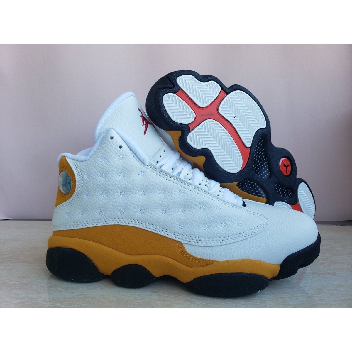 Blue and orange jordan 13 best sale