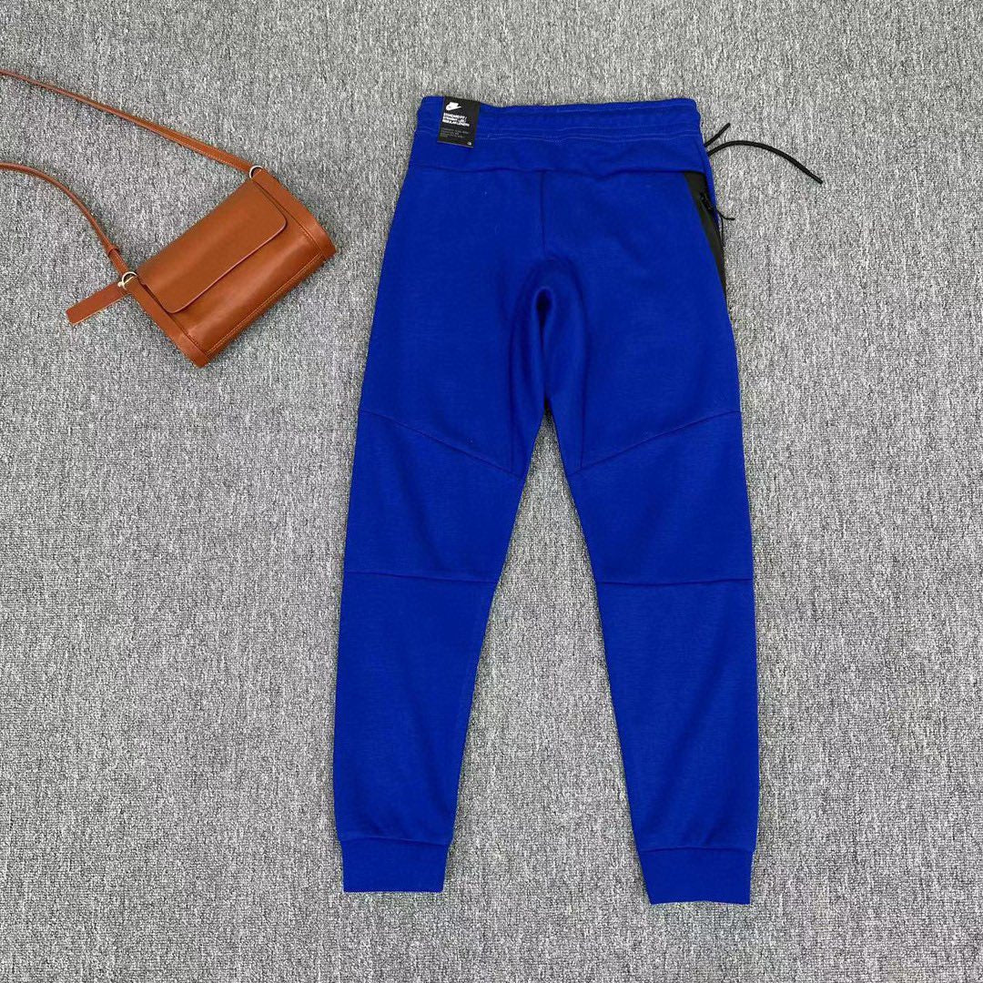 Nike modern fleece 2025 pants blue